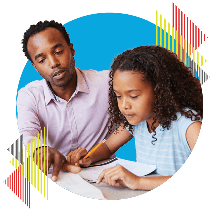 teacher with kid at table studying